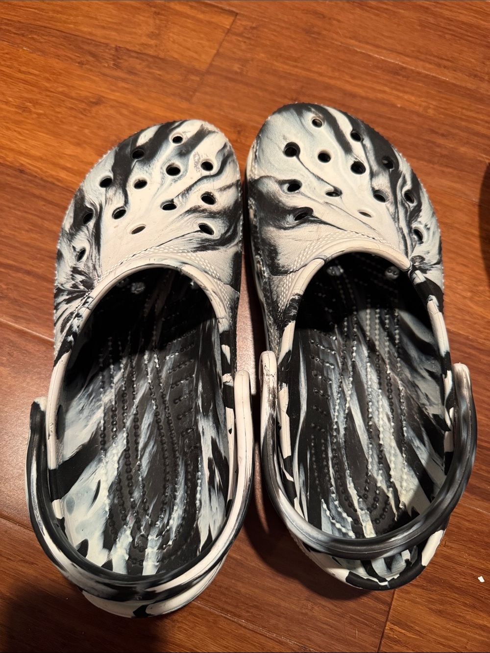 CROCS Marbled Slip-On Clogs in Black & White